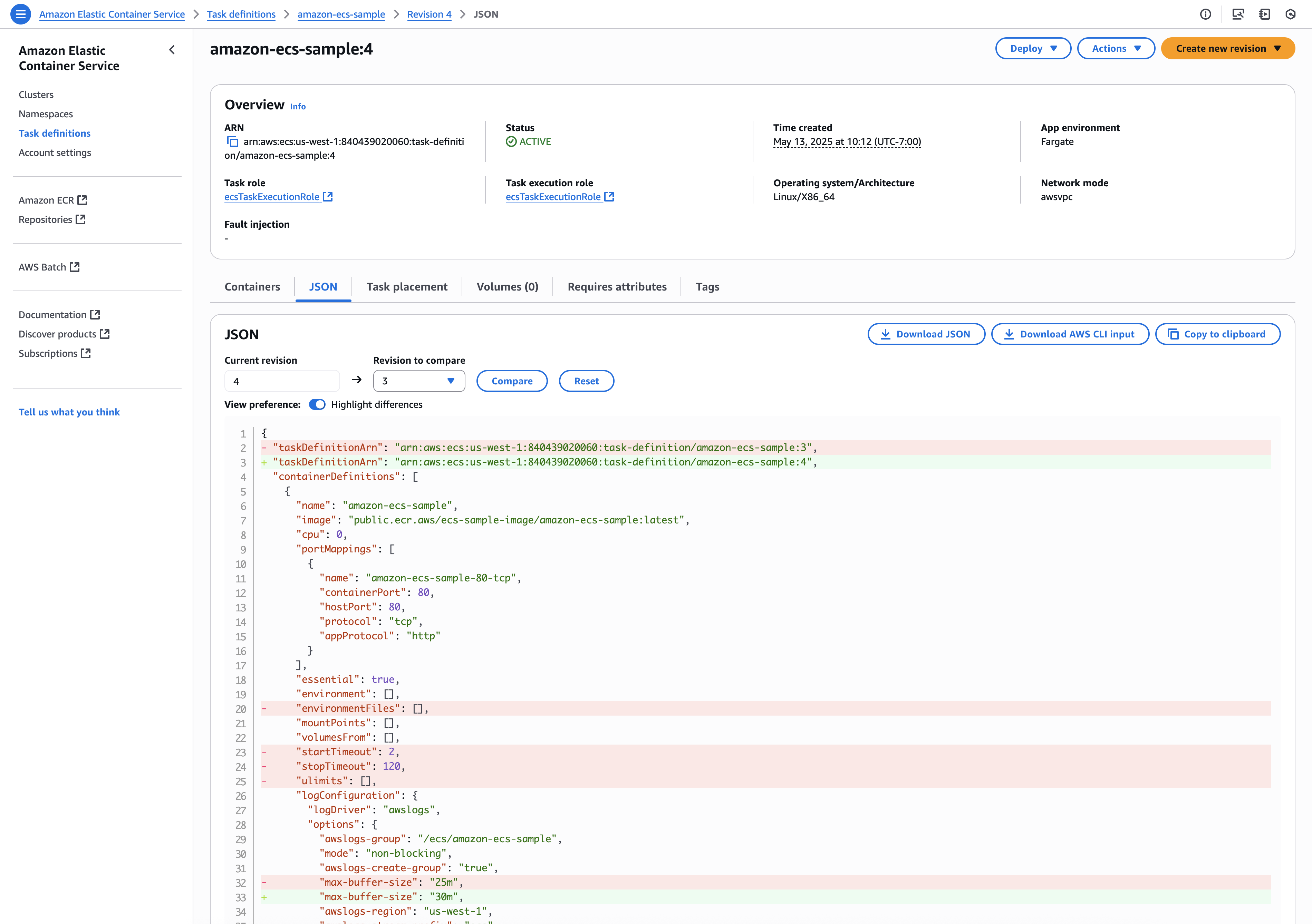 The ECS task definition JSON tab with the compare feature: a current revision field and a revision-to-compare dropdown feed a Compare button, and the JSON below shows a line-level diff with removed lines in red and added lines in green